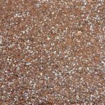 Close-up of PG42 Potting Soil Blend, a fine reddish-brown potting soil with white specks