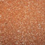 Close-up of #6 Potting Soil Blend, a fine orange-brown potting soil with light specks