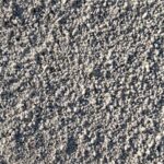 Close-up of Kitty Litter Pumice 3/16″-1/16″, small light gray pumice granules