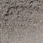 Close-up of fine washed sand, an even gray-brown sand available at Pro-Gro in Sherwood, OR